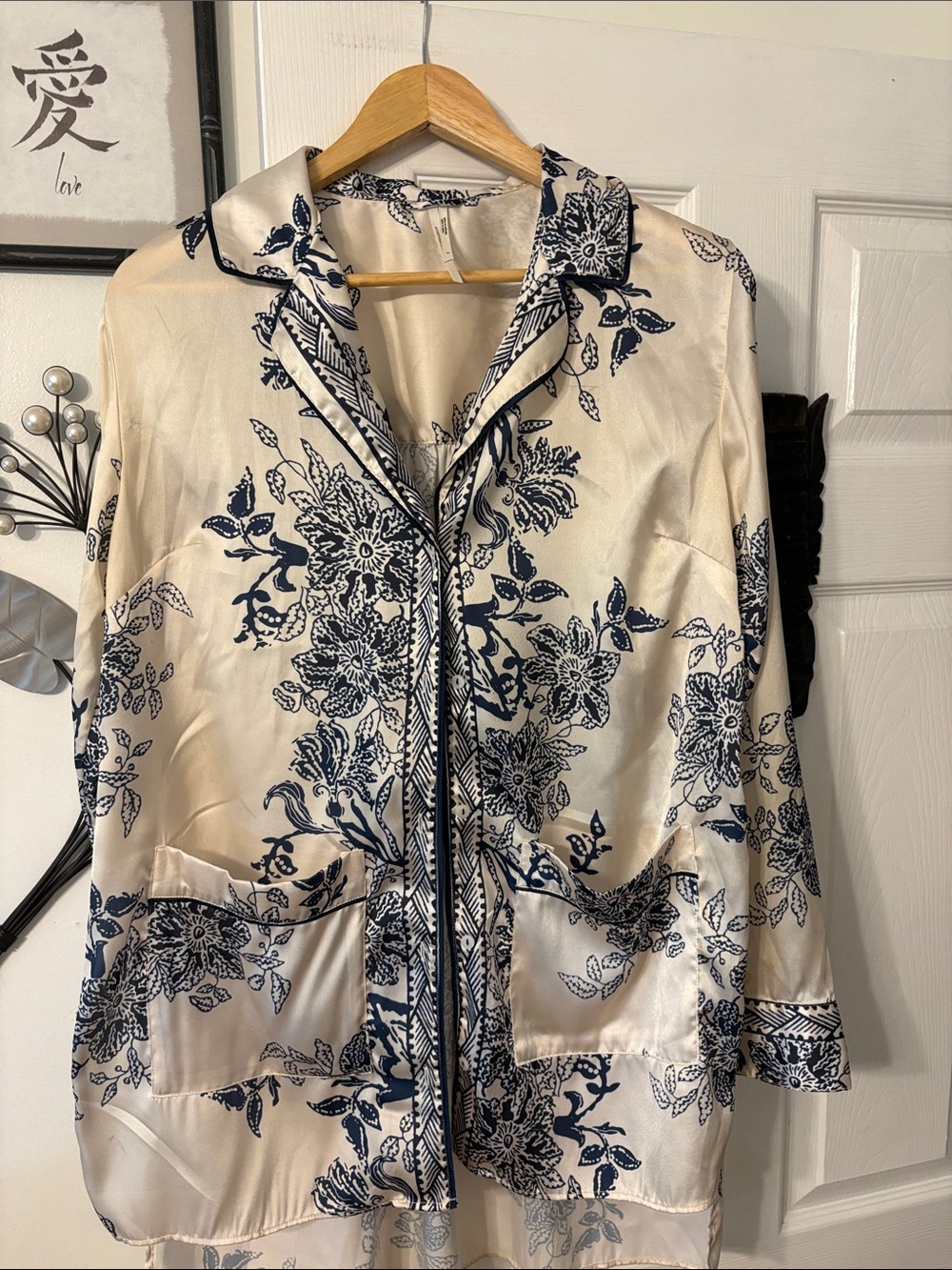 Anthropologie Cream Top with Navy Floral Print